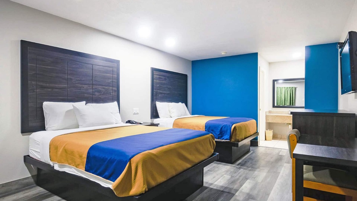 Wharton Hotel | Two Queen Beds Kitchenette Non-Smoking Room at Scottish Inns and Suites!