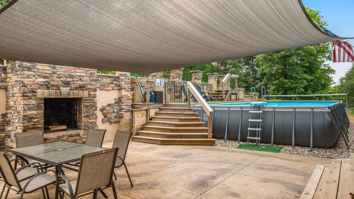 Rome House | Two-story, dog-friendly home with a pool, indoor/outdoor fireplaces, & AC