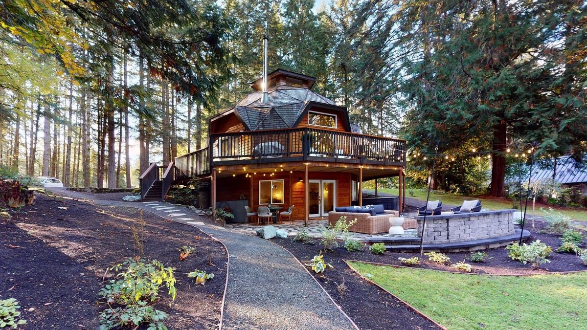 Burley House | Unique waterfront home with sauna, hot tub, and washer & dryer