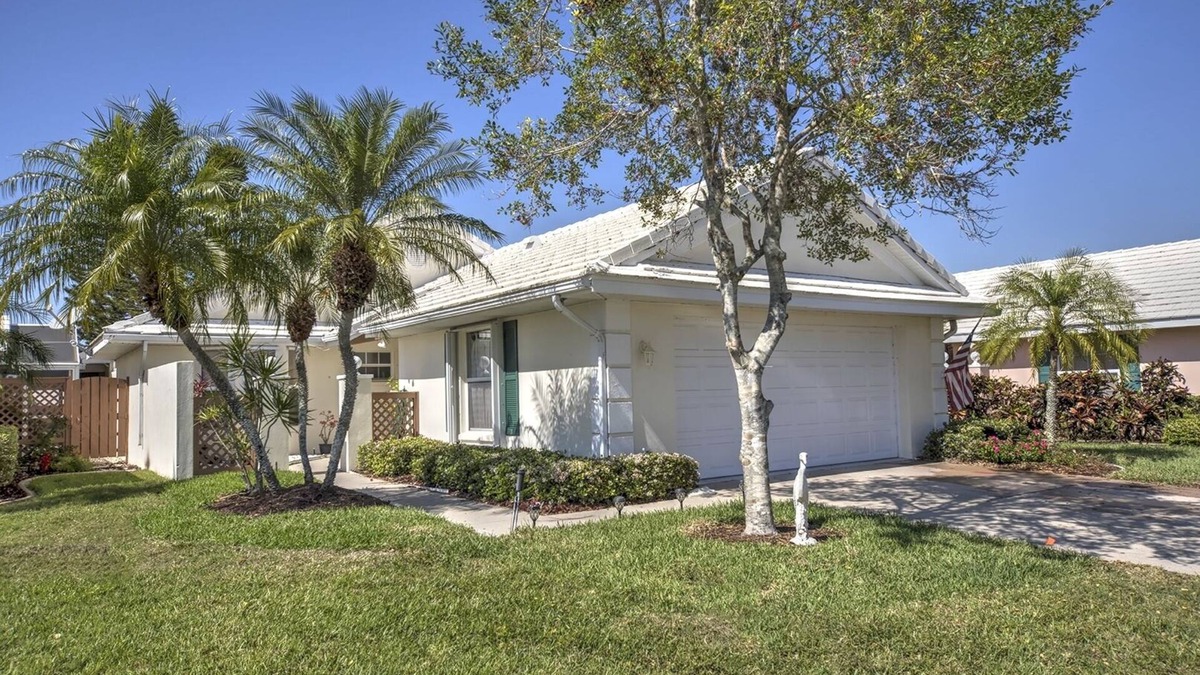 Plantation Villa | Updated modern villa with beautiful lake views and sunsets.