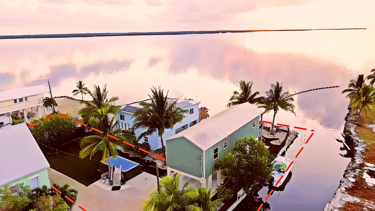 Sands House | Upscale ocean front home & easy canal boat access to Gulf or Atlantic