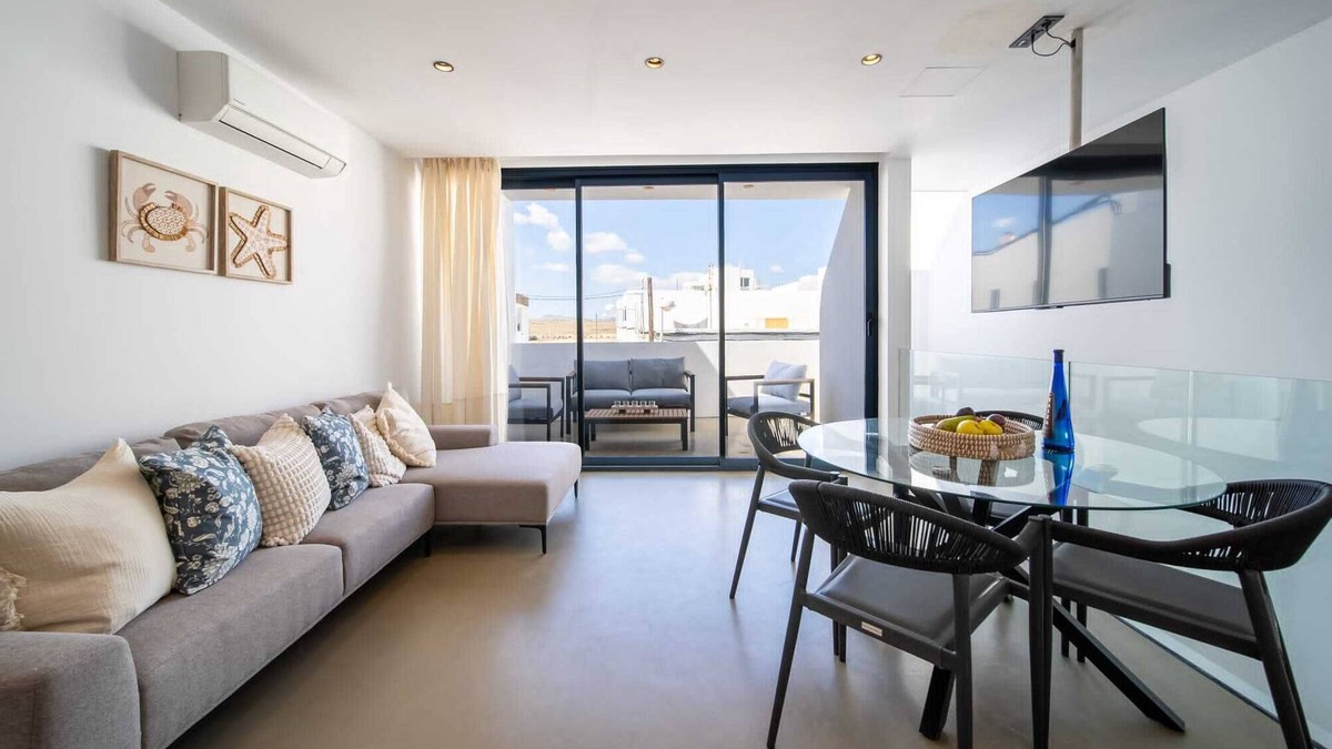 Caleta de Famara Apartment | Vacation 'Kay Lava' with Mountain View, Wi-Fi and Air Conditioning