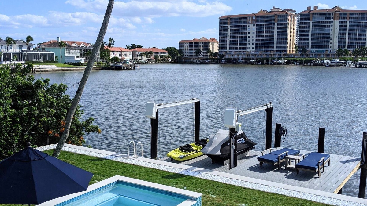 Connors House | Vanderbilt Lagoon Waterfront Home - HUGE VIEWS - Walk to Vanderbilt Beach