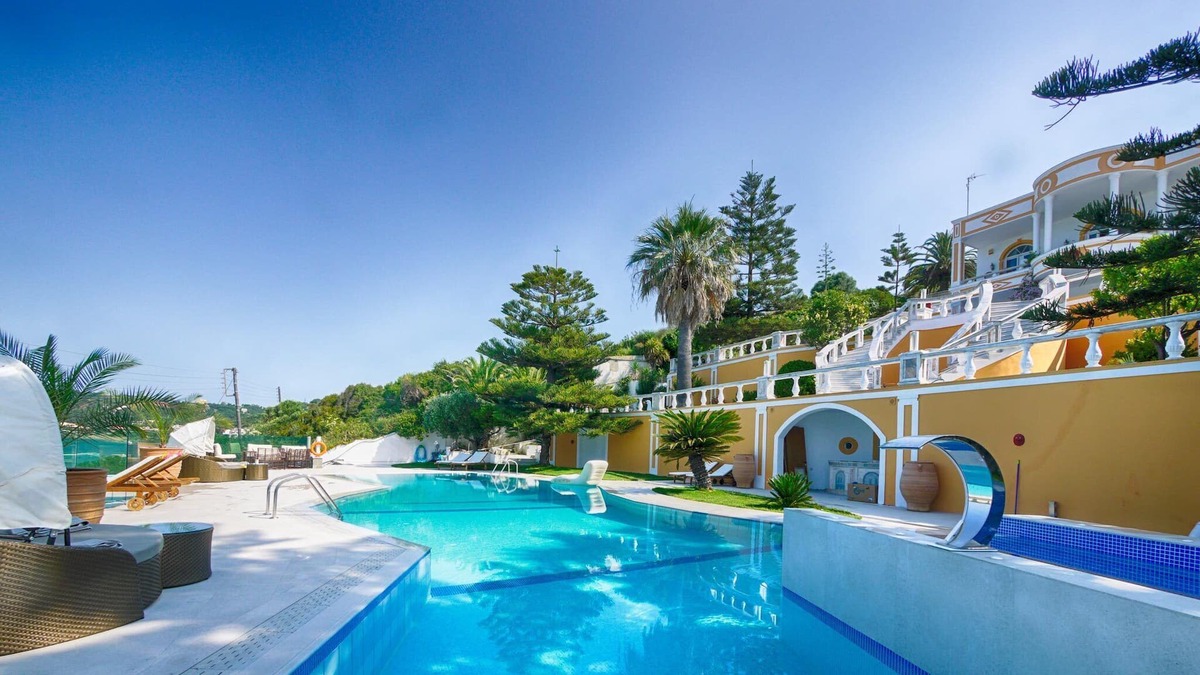 Agios Georgios Pagon Apartment | Villa Athanasia Apartment 1 right on the beach with sea views and pool