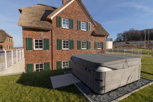 Lohme House | Villa BalticBliss auf Rügen - direkt am Golplatz mit Sauna und Jacuzzi