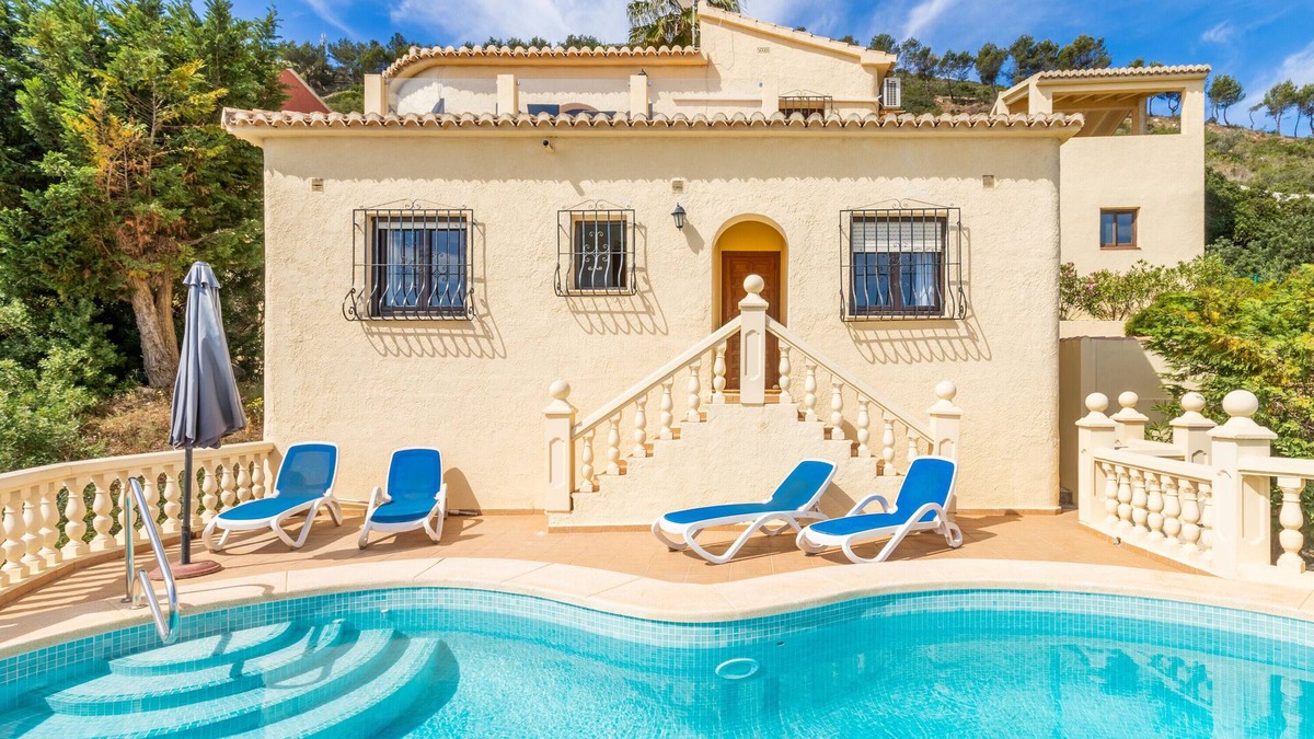 Benitachell Villa | Villa 'Vista Ibiza' with Sea Views, Private Pool, Garden, Balcony, Wi-Fi & A/C