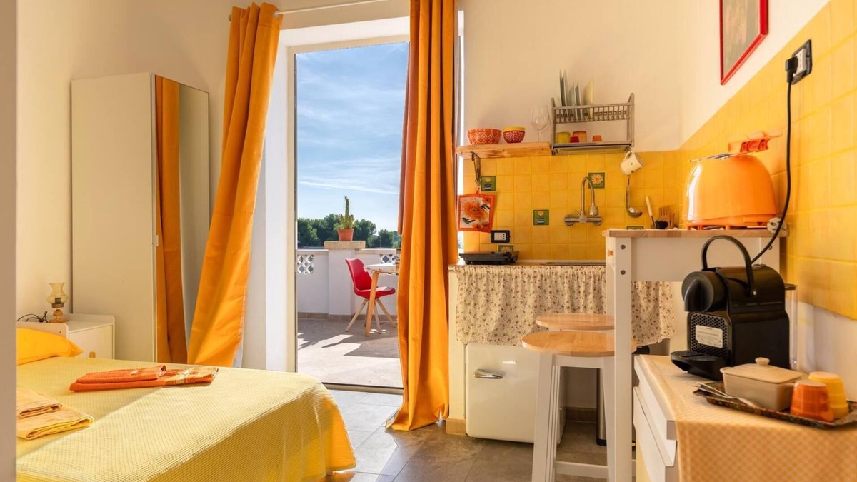 Monti D'arena-Bosco Caggione Apartment | VillaSalentu.it, Lu Sule with a huge terrace overlooking the sea, sky, land.