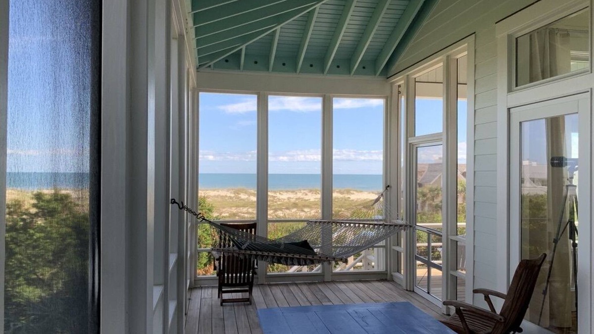 East Beach House | Visit Bald Head Island in March. Peaceful porches with stunning ocean view!