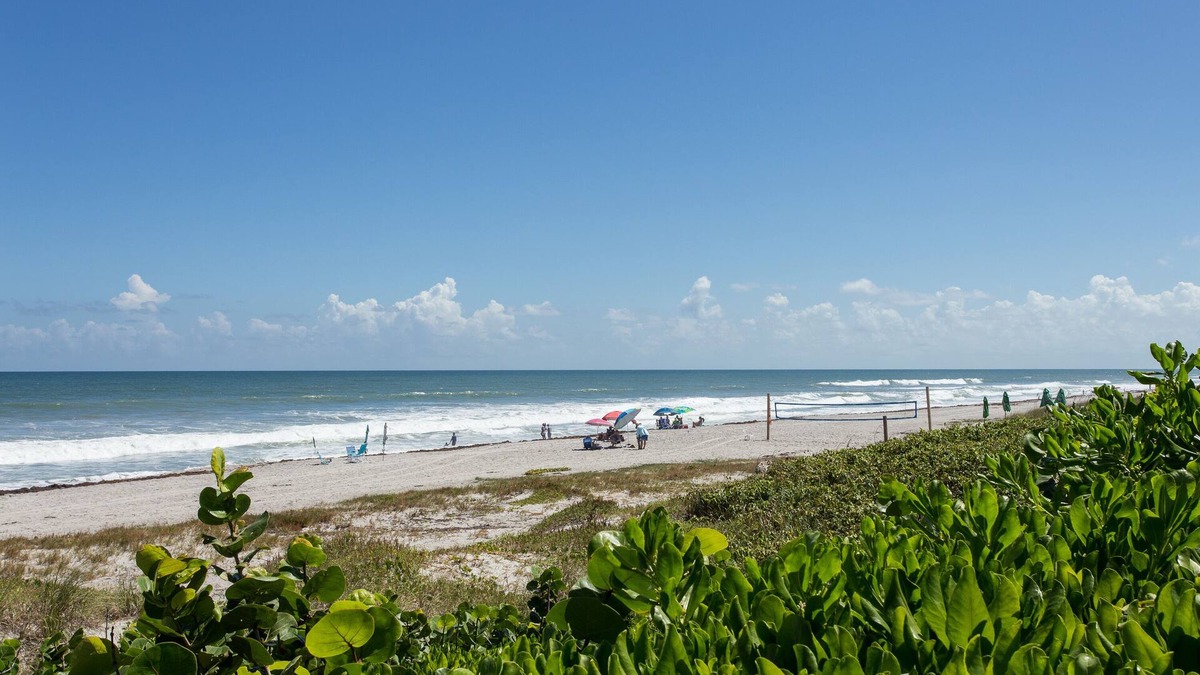 Melbourne Beach House | WALK TO BEACH AND HEATED POOL! Beachside Paradise One Block from Ocean!