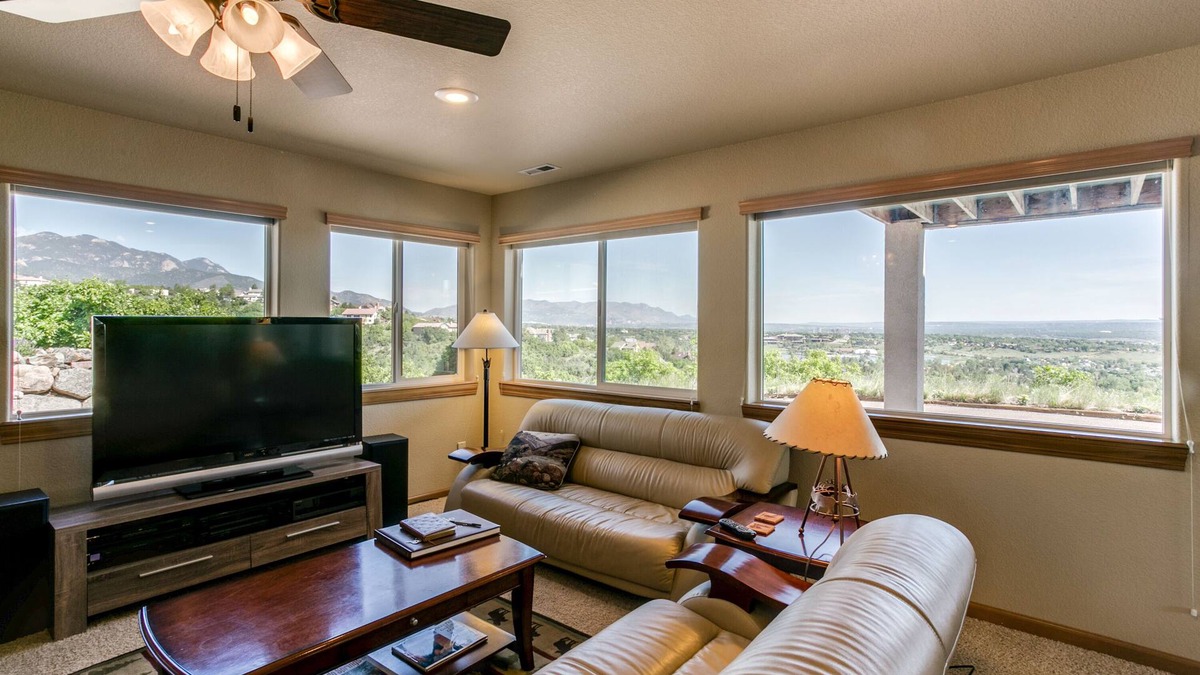 Southwest Colorado Springs Apartment | WALLS OF GLASS! Mountain top apartment, panoramic mt. views and city lights.