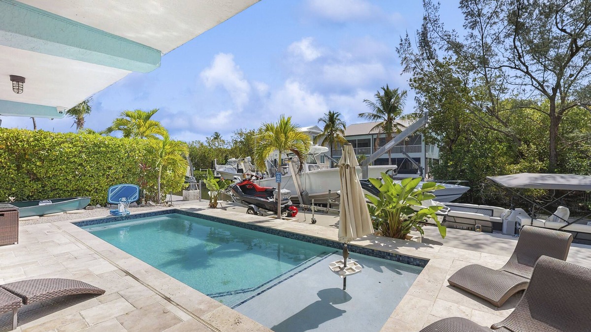 Key Largo House | Waterfront getaway w/stunning view, dockage, private pool, ping-pong, gas grill
