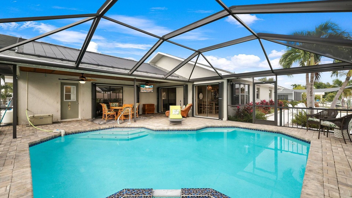 Lochmoor Waterway Estates House | Waterfront Heated Pool Home Retreat, Direct Gulf Access, Special Deals