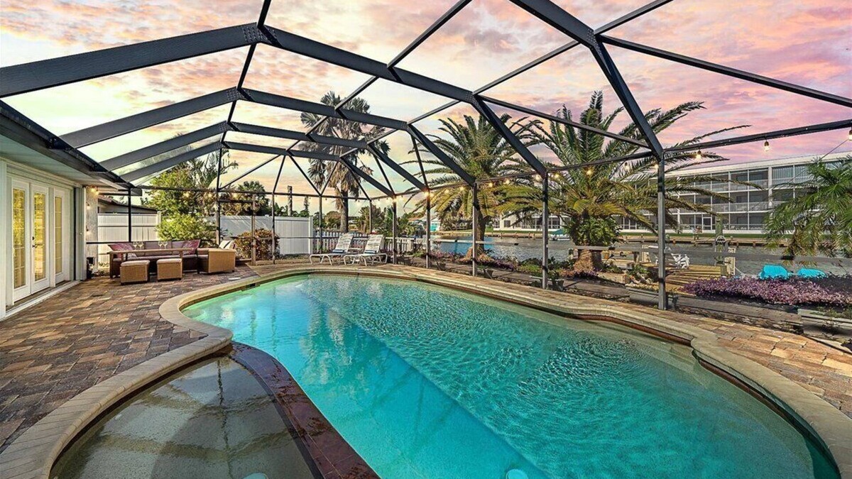 Cocoa Isles House | Waterfront-Heated Pool-Hottub-4bd-2BA-Paddle boat- Kayaks