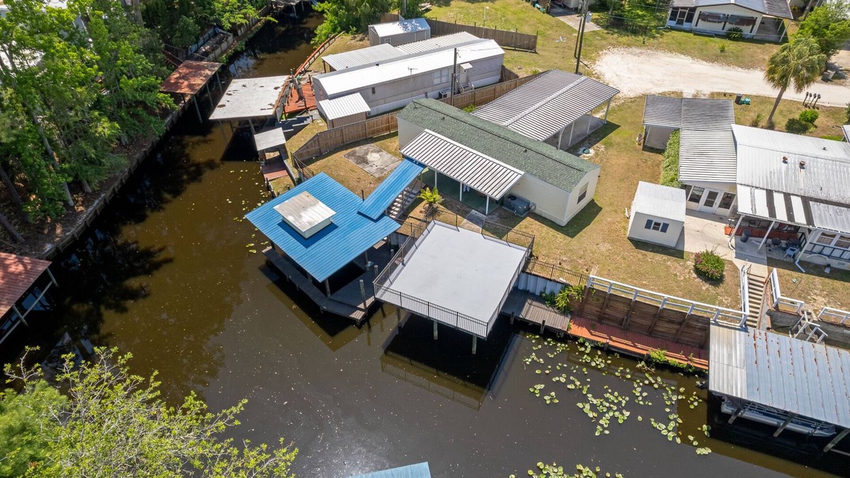 Satsuma House | Waterfront home in Satsuma. Two bedrooms each with full bath. Gas grill.