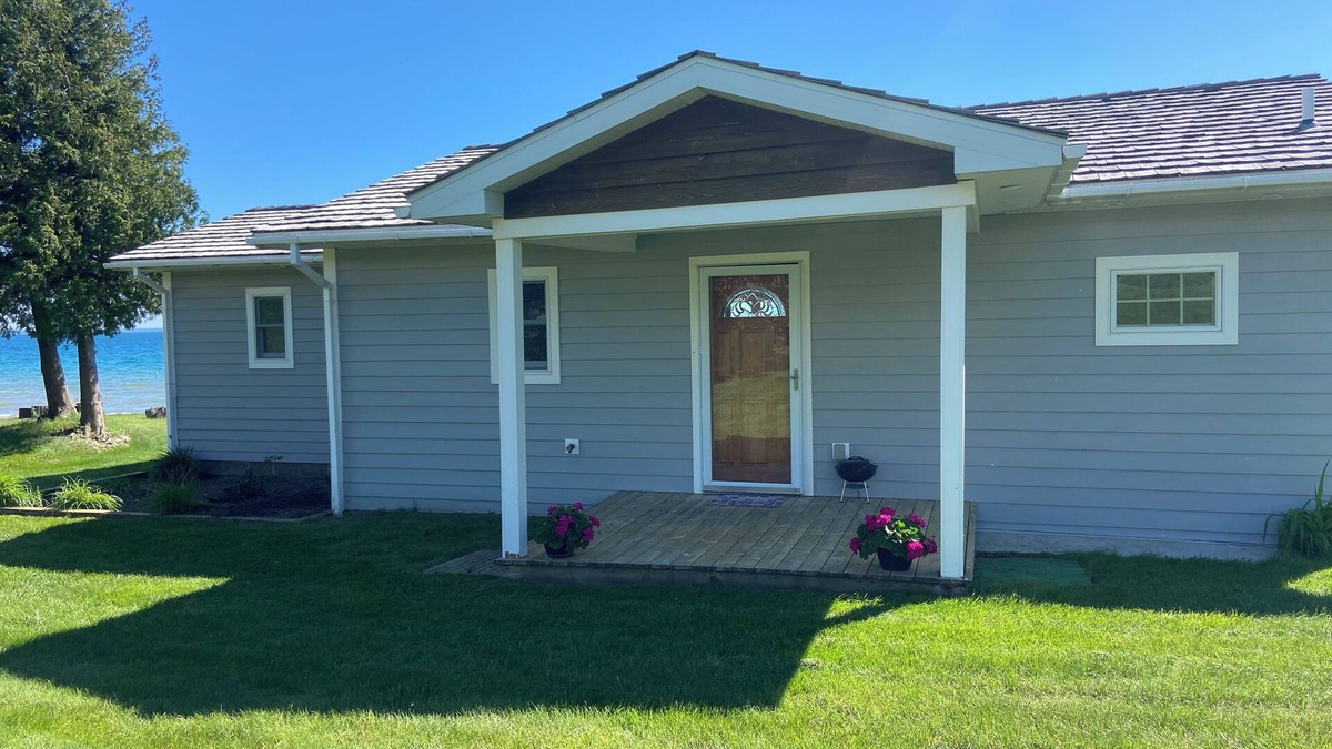 St Ignace House | Waterfront home on Lake Michigan with views of St Helena Island Lighthouse