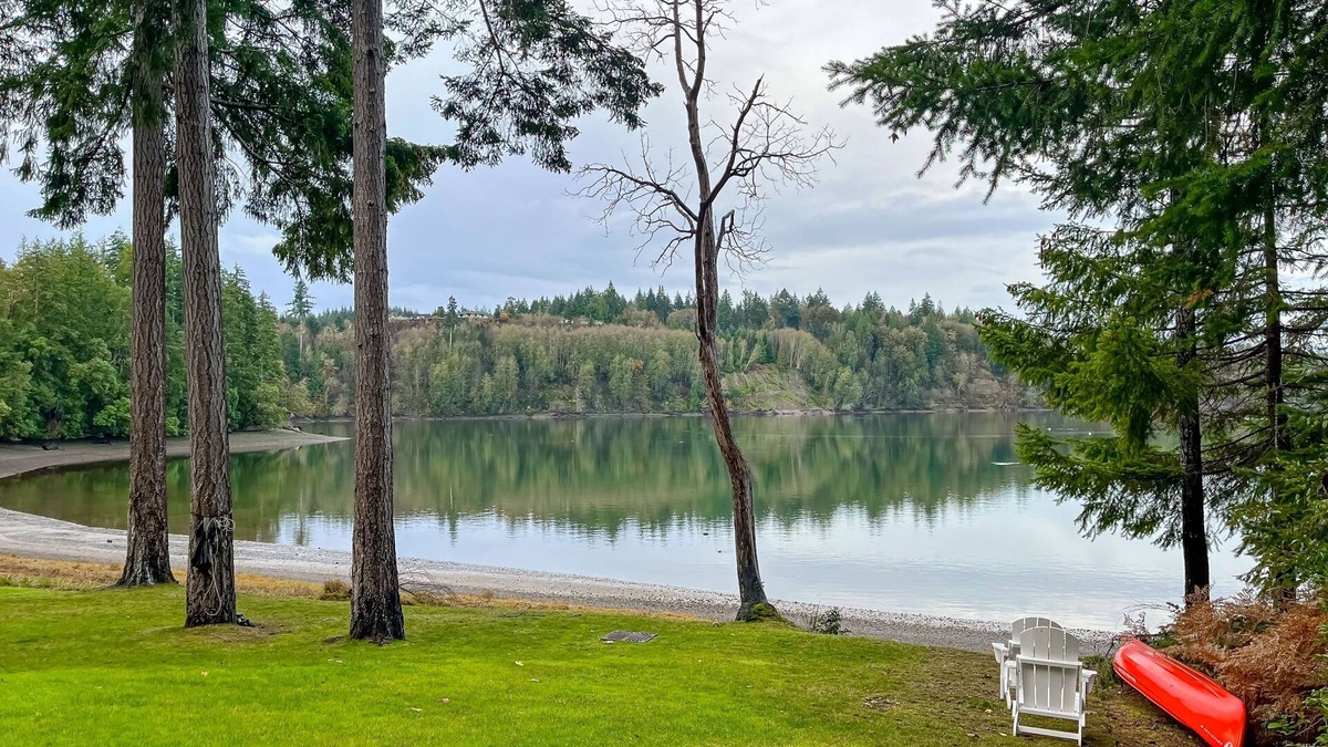 Shelton House | Waterfront home with private hot tub, patio, games, & gym room