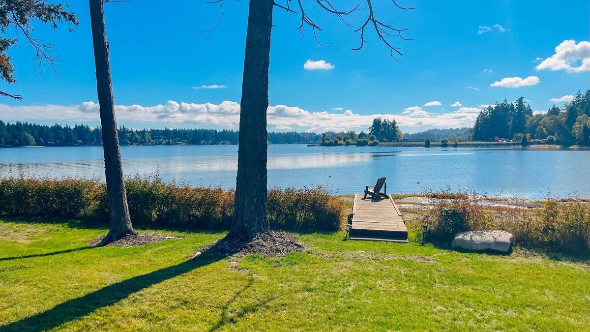 Erlands Point-Kitsap Lake House | Waterfront home with beach access, firepit, fireplace, water views, grill, dock