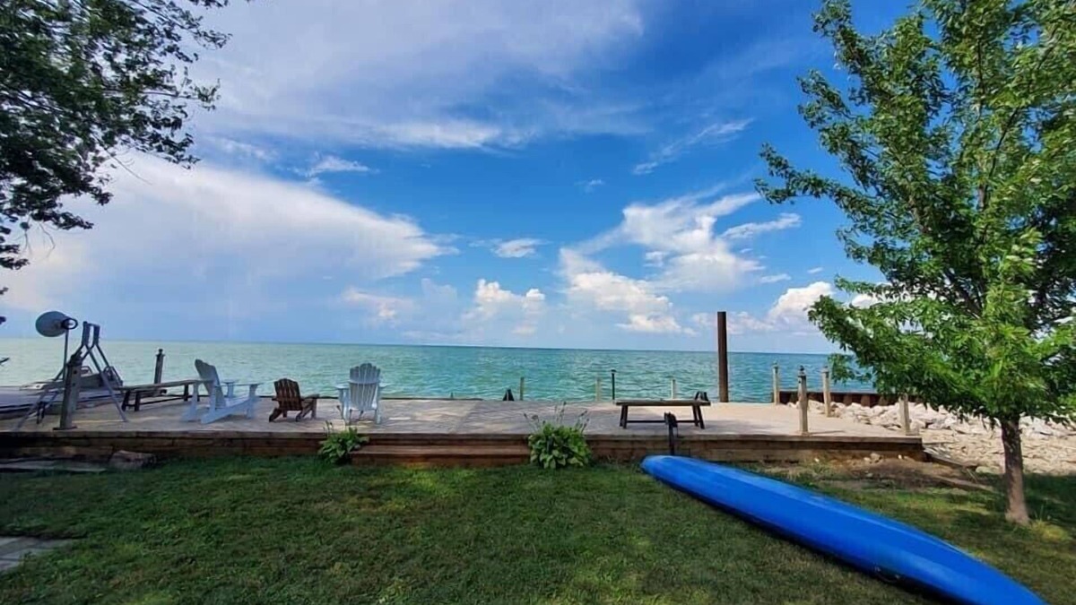 Pointe aux Roches House | Waterfront House next to Golf Course.