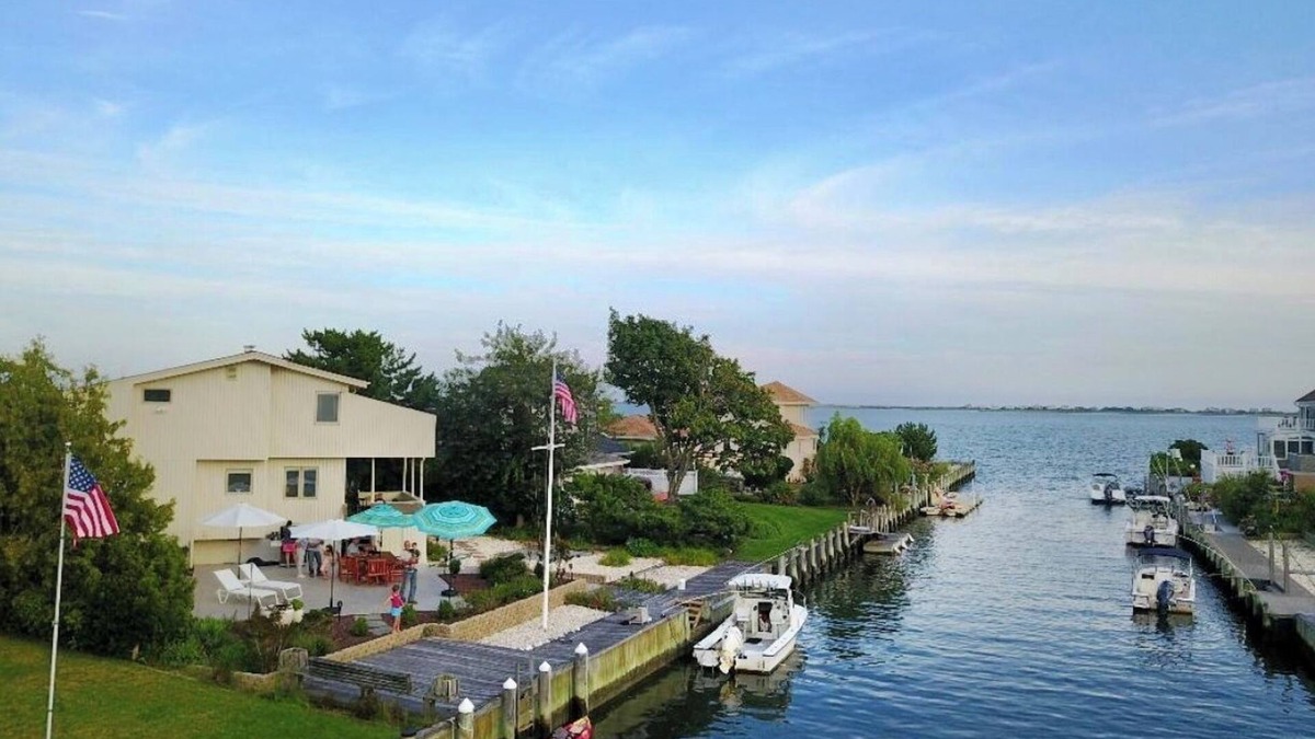 East Quogue House | Waterfront in the Hamptons. Summer 2026 dates available now.