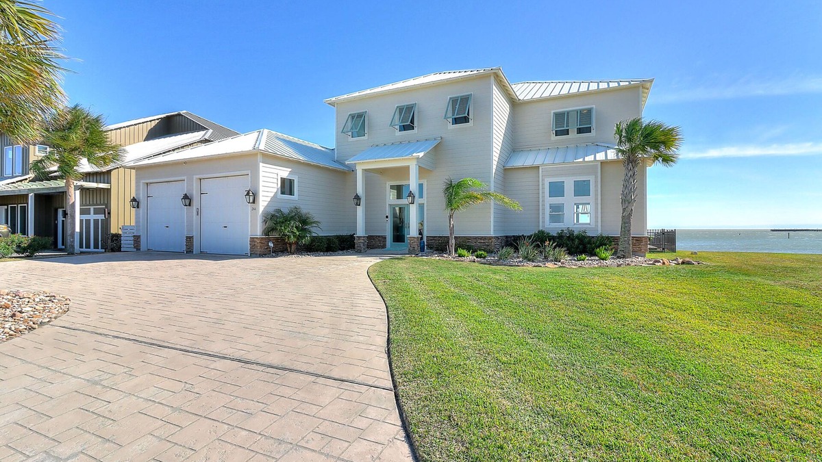Rockport House | Waterfront infinity pool paradise with stunning sunset views at The Reserve