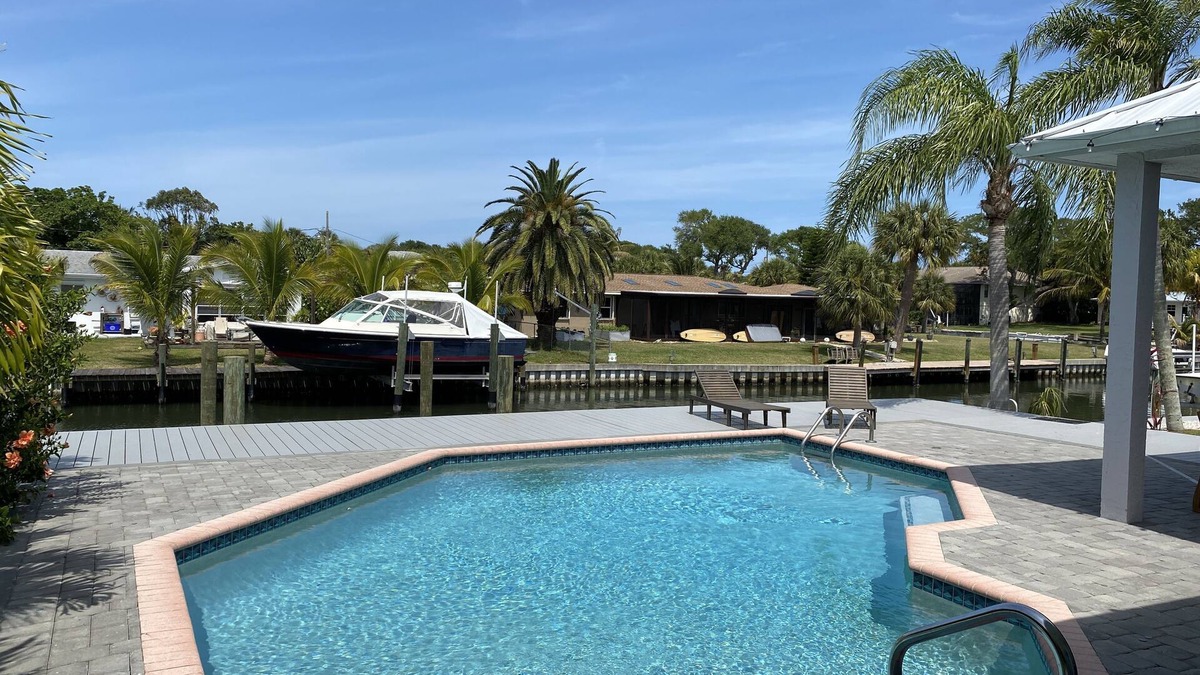 Silver Shores House | Waterfront Island Pool Home, Walk to Beach, dock your boat includes boat lift