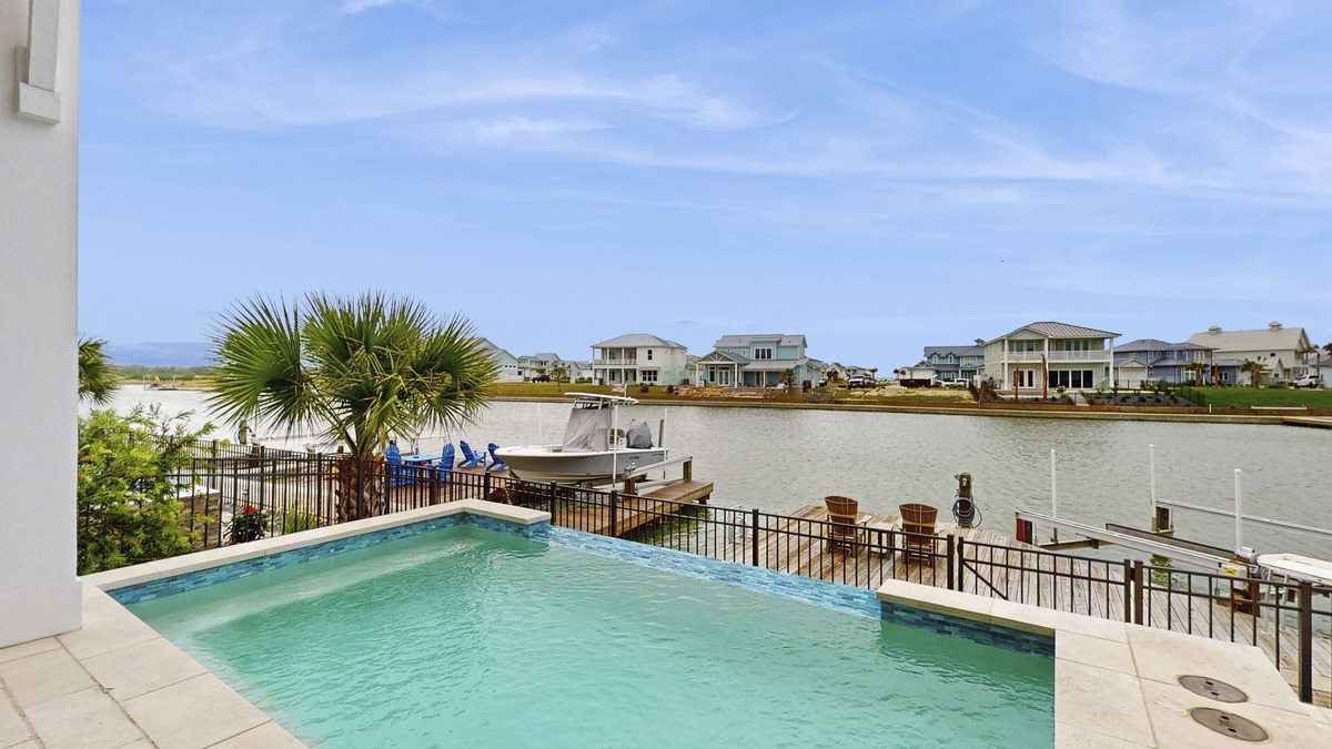 Rockport House | Waterfront luxury with private dock, outdoor kitchen, infinity pool & pier