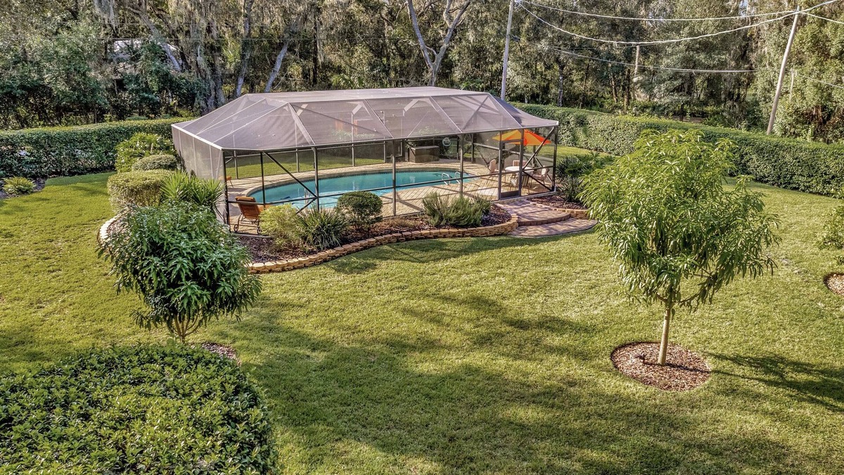Temple Terrace House | Waterfront, oasis, family retreat, 5 minutes from theme park,