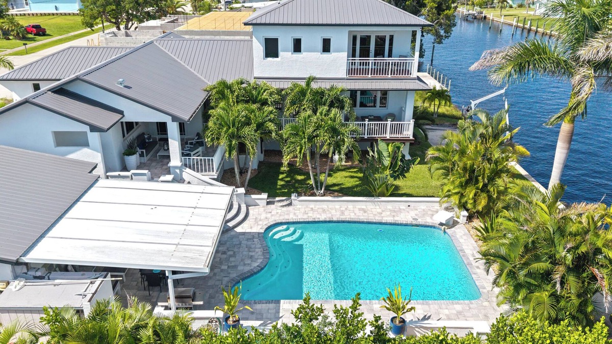 Edgewater Villa | Waterfront Paradise with heated saltwater pool and amazing views gulf access