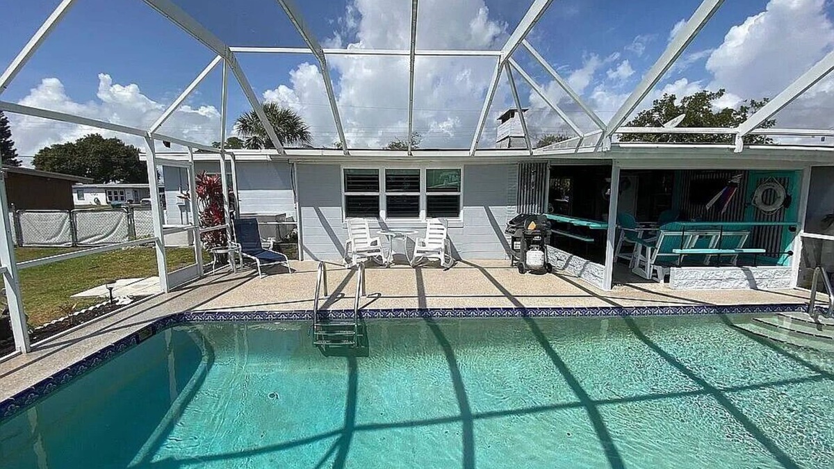 Port Charlotte - Charlotte Harbor House | WATERFRONT/POOL HOME W/GULF BREEZES, TIKI BAR BOATS, LINAI, PETS OK, INCLUSIVE!