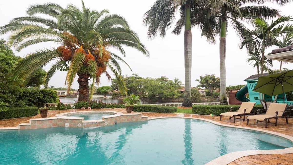 Sunset House | Waterfront Property with a resort style backyard and Heated Pool in Miami