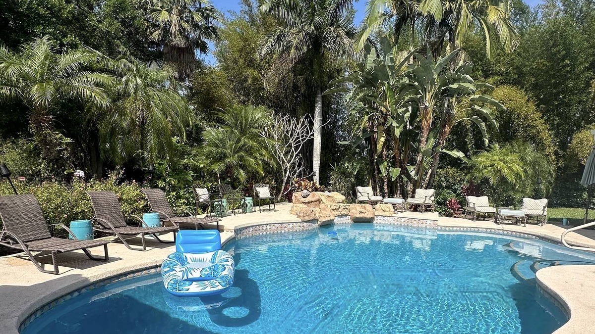 Wellington House | Waterfront Resort Style Oasis ~ 2 Acres, Heated SW Pool, Fire Pit, Outdoor Games