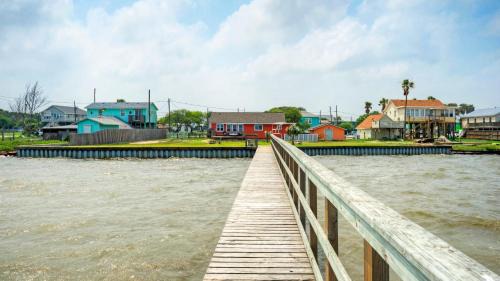 Flour Bluff House | Waterfront Retreat w Private Boat Dock Patio Views Shore Thing by AvantStay