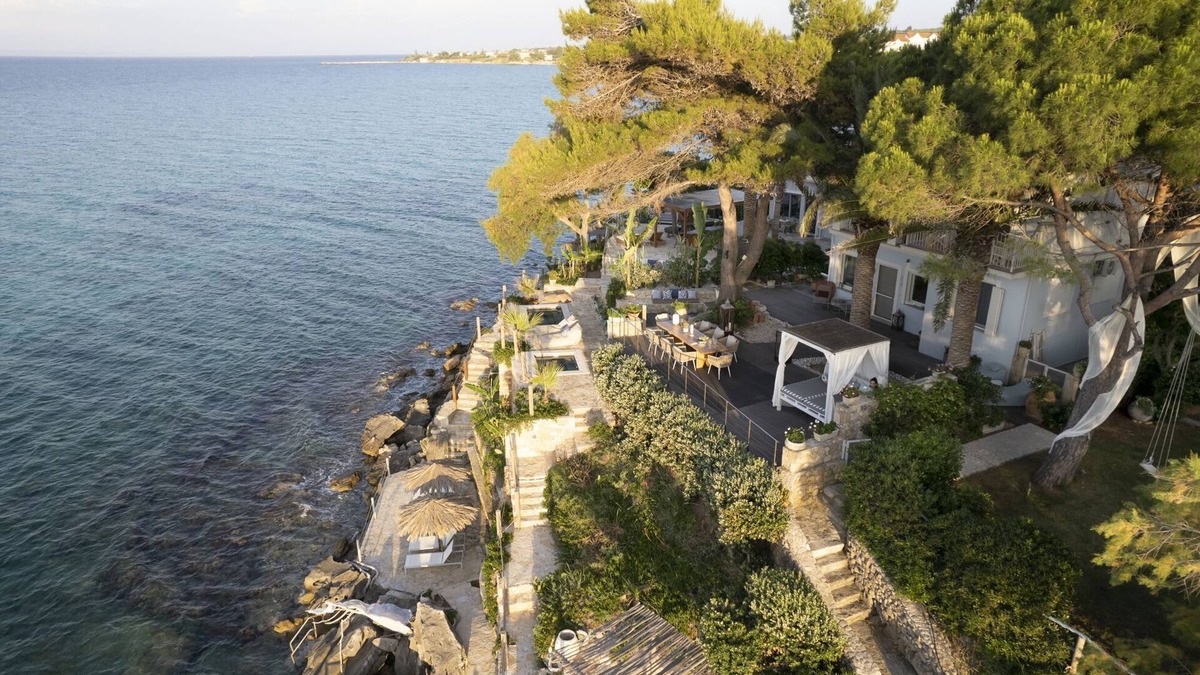 Amoudi Villa | Waterfront Villa Alexandros with Outdoor Jetted Tub