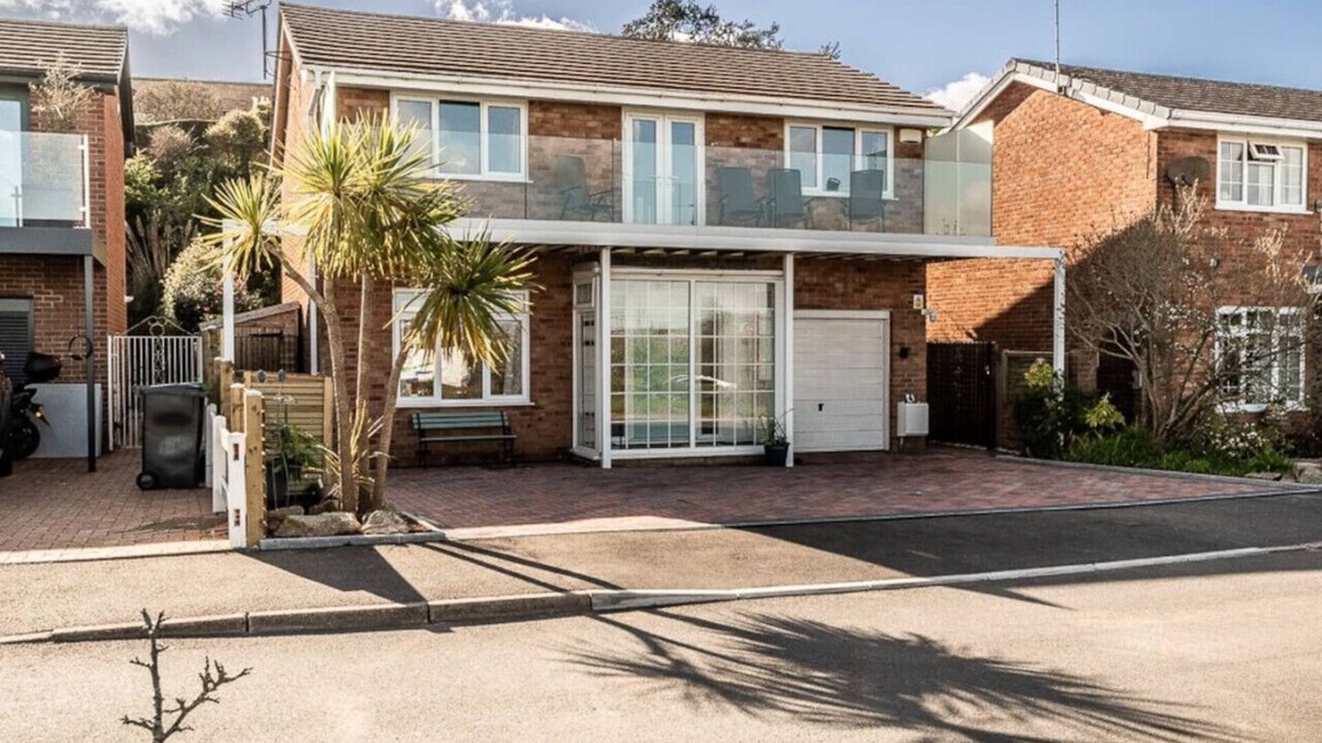 Ebford House | Waterside retreat with estuary views and balcony