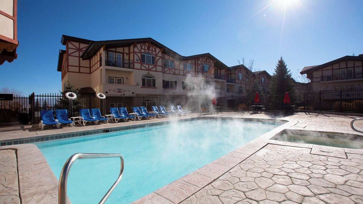 Midway House | Welcome to Swiss-charmed Mountain Retreat, a spacious 4-bedroom chalet perfect for your next getaway! Our chalet comfortably accommodates up to 14 guests with a total of 10 beds. Please note that the Murphy bed is located in a loft.