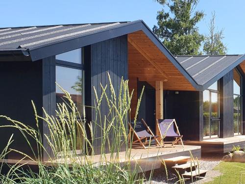 Boiensdorf House | Werder Chalet - COZYKOJE - Ostsee Strand 150m I Sauna I eKamin I Tiny House mit Meerblick I 2 Pers und Kind I by "Meyers am Meer"