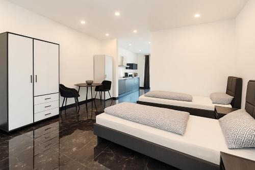 Loehne Apartment | Werre Apartments mit Smart-TV - stilvol, zentral & wohnlich