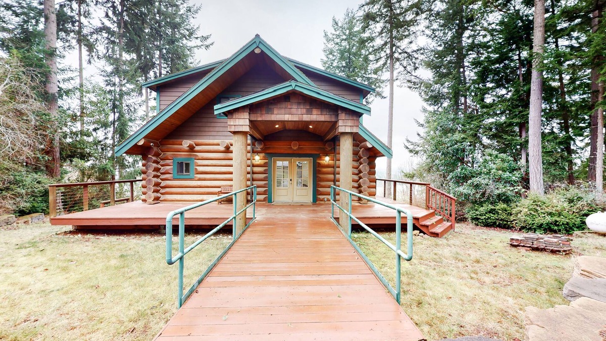 Anderson Island House | Whimsical island stay with Sound view, grill, wrap-around balcony, & game room