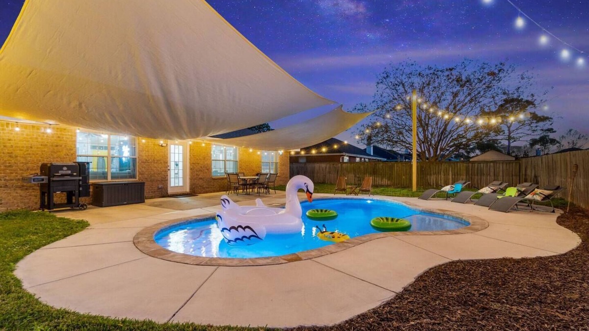 Navarre House | Whispering Paradise: Heated POOL & GAME ROOM