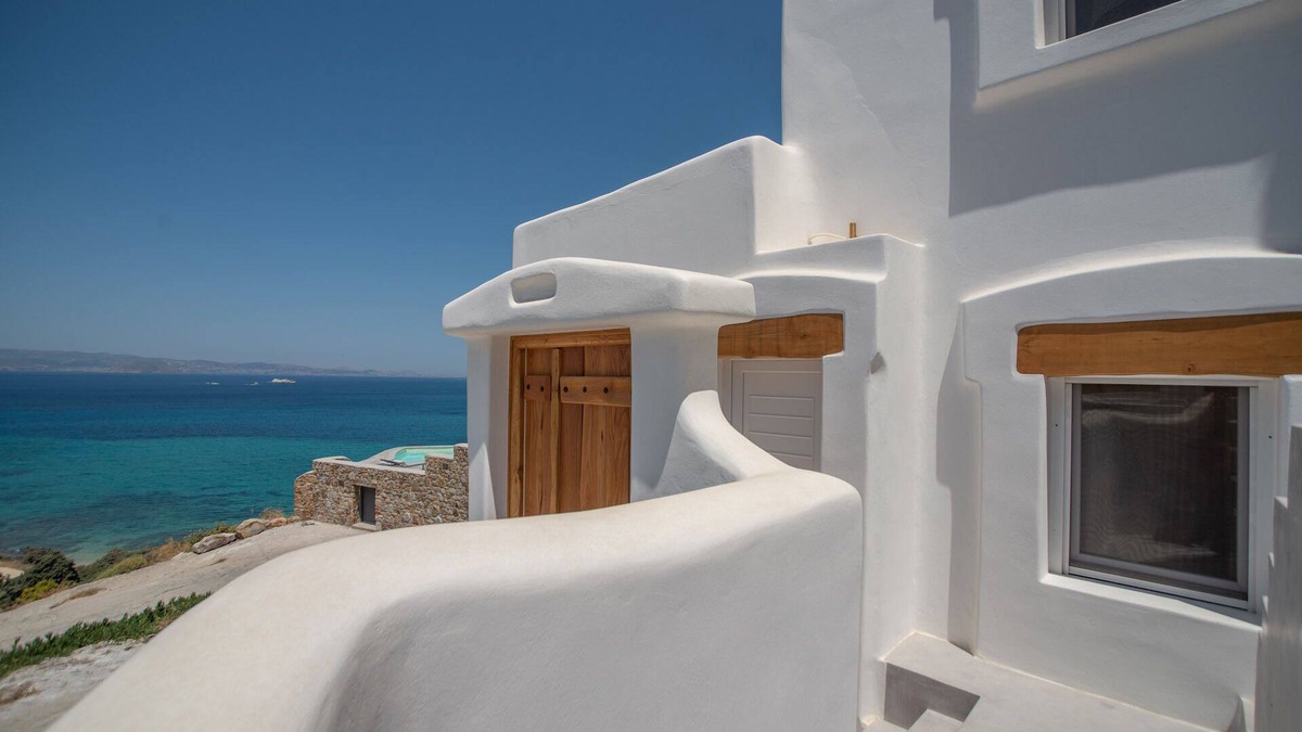 Maragas Villa | White Stone Art Villa, luxury seaside ORKOS Plaka, sublime panorama