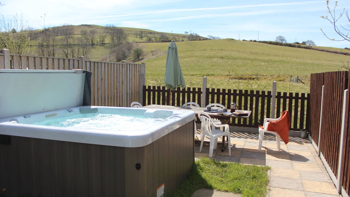 Tregaron House | Whole house sleeps 5, private garden with hot-tub, pet friendly.