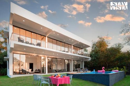 Zirad Villa | Wildflower Villa by StayVista - Poolside retreat with contemporary interiors & indoor activities