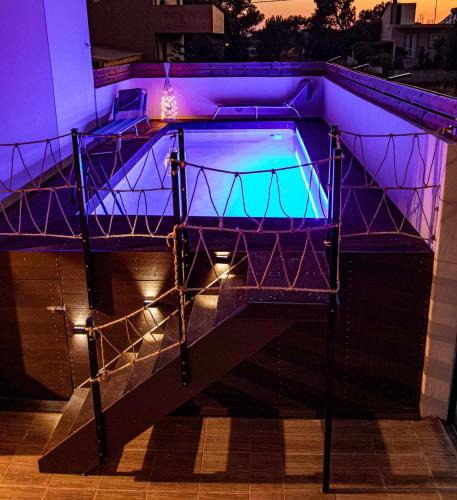 Tymbaki House | Woodoven home - pool, bbq & outdoor cinema