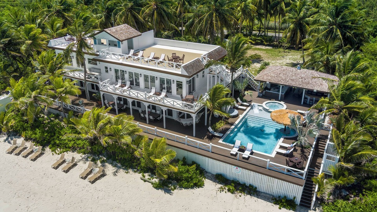 Tar Bay Villa | Zen Exuma: Stunning Beachfront Villa w/NEW Rooftop Lounge, Spa, Cabana & Pool!