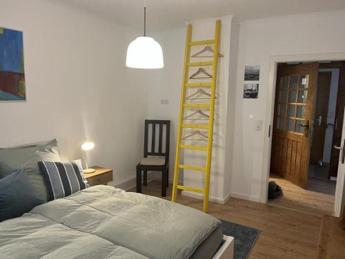 Langendiebach Apartment | Zum Turmstorch - frisch saniert, modern, eigener Zugang