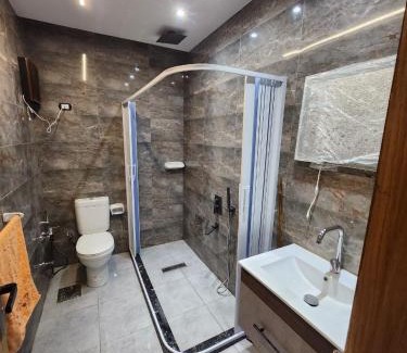 Al-Basatin Apartment | شقة مفروشة بكمبوند وان قطامية معمار المرشدي