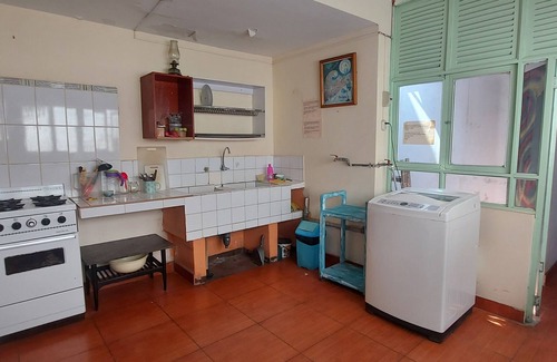 Miraflores House | 10 minutes walking from Kennedy park. Access to a kitchen and a terrace.