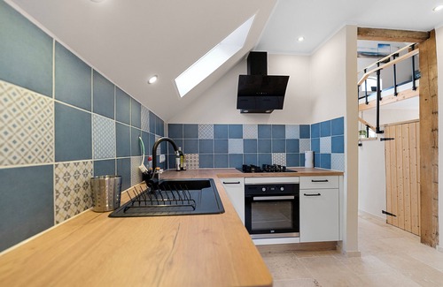 Spetzerfehn House | 100-jähriges Fehnhaus an der Wieke mit Kamin