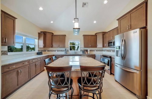 Fort Myers Beach House | 1940 Luxury 6BR Home: Heated Pool, Spa, Near Beach!
