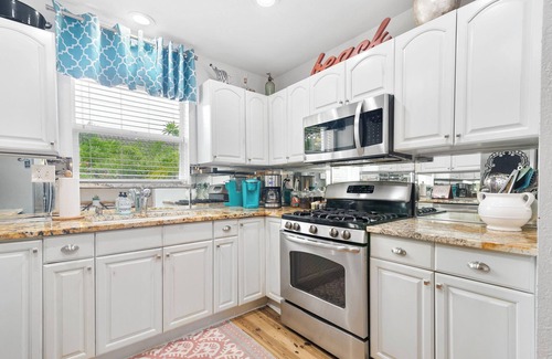 South Palm Park Neighborhood Association House | 2 Amazing Beaches in 1 mile Palm Oasis 4|4 w/POOL & Covered Outdoor Entertaining